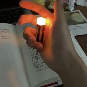 /2026 New World Torch Light Torch Can Shine Keychain Mini Model Pendant Toy Most Popular Festival Mode