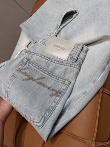 กางเกงยีนส์ทรงหลวมขาบานลายตัวอักษรปักสีขาว กางเกงขายาวทรงตรงกระชับสัดส่วน กางเกงขายาวทรงหลวมเอวสูง ฤดูใบไม้ผลิ 2025