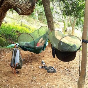 Lightweight Outdoor & Indoor Swing Chair Bed: Mosquito Net Anti-Tip & Compact Camping Furniture