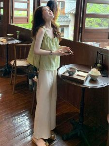 ชุดสองชิ้นสไตล์ฝรั่งเศสสำหรับผู้หญิงในช่วงฤดูร้อน ชุดเสื้อกั๊กแขนกุดสีเขียวสบายๆ ทรงหลวม กระโปรงทรงเอเอวสูง ทรงหลวม สไตล์ลำลอง