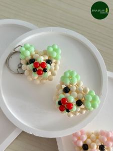พวงกุญแจลูกปัด รูปหน้าหมู สีพาสเทล ขนาด 6 มิล คละสี