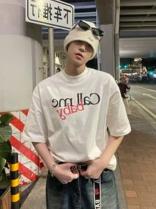 เสื้อยืดแขนสั้นผ้าฝ้ายสไตล์อเมริกันสำหรับผู้ชาย ทรงหลวม ดีไซน์เก๋ไก๋ ระบายอากาศได้ดี ใส่สบาย ฤดูร้อน 2023