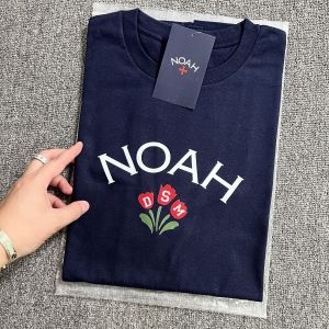 เสื้อยืดคอกลมแขนสั้นผ้าฝ้ายแท้ Noah RTCC ทรงหลวมสำหรับฤดูร้อนปี 2024 สไตล์อเมริกันสำหรับคู่รัก เสื้อยืดผู้ชาย