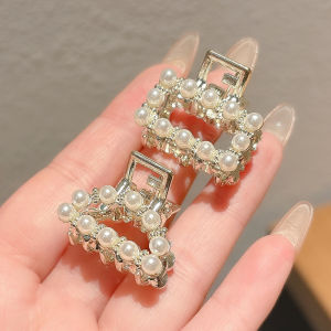 NING ZHOU | Delicate And High-class Small Metal Clamp
