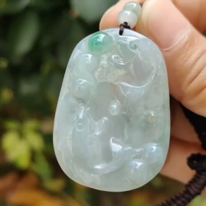 Crafted with pair of fish on Natural Type A Jadeite Jade as pendant certificate weighs 13.22 grams measurement 42.8 * 30.3 * 5.2 mm (pendant343)
