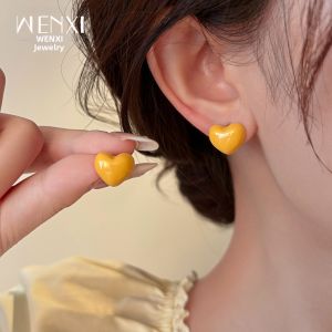 WENXI | Bông Tai Hình Trái Tim Màu Vàng Sữa Thiết Kế Niche 2026 Elegance