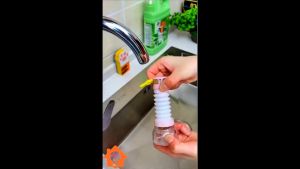 Đầu nối vòi rửa chén rửa bát bằng nhựa có cánh quạt tăng áp lực nước xoay 360 độ có hạt lọc có thể kéo dài.