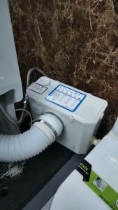 Máy xử lý chất thải bồn cầu dùng cho bồn cầu thoát ngang