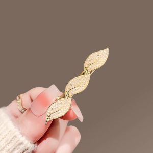 Exquisite Pearl Leaf Hair Clip: A Must-Have Women Fashion Accessory