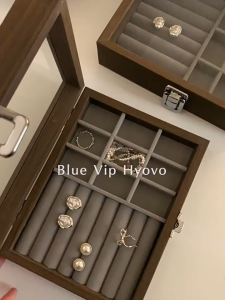 Elegant Wooden Jewelry Organizer Box Keep your favorite jewelry neatly organized and easy to find with this elegant wooden jewelry storage box. Featuring a transparent glass lid and multiple compartments it is perfect for rings earrings necklaces brac