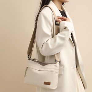 กระเป๋าเป้สะพายหลังผ้า Oxford สำหรับผู้ชายและผู้หญิง กระเป๋าสะพายข้างแบบสะพายข้างแบบลำลอง ทรงสี่เหลี่ยมเล็ก วัสดุไนลอน