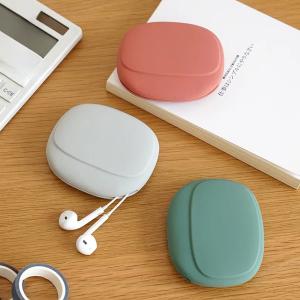 Sudyod【มีสินค้าในสต๊อก】 กระเป๋าใส่หูฟัง สายชาร์จ กระเป๋าเก็บของ แบบซิลิโคนนิ่ม ทรงวงรี แบบพกพาสะดวก กันน้ำ Storage bag