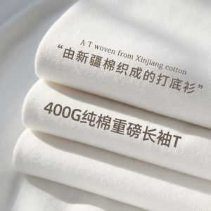 เสื้อยืดคอกลมแขนยาวทรงหลวมผ้าฝ้ายแท้หนาสำหรับฤดูใบไม้ร่วงและฤดูหนาวสำหรับผู้ชายและผู้หญิง คู่รัก แฟชั่น ลำลอง ระบายอากาศได้ดี