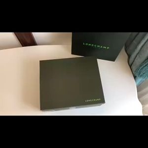 Color-coded logo embossed cowhide dumpling bag Womens bag mini crossbody bag Hand makeup bag Single handle shoulder bag