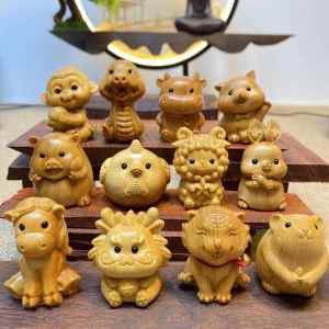 TILAIEN | Zodiac Themed Carved Wooden Figurine