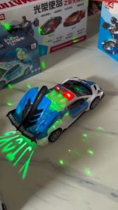 Xe Cảnh Sát Pin Di ChuyểnCó thể mở cánh cửa và cốp Quay Vòng Theo Nhạc Cùng Hiệu Ứng Đèn Nhấp Nháy