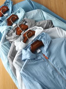 Laser Drilling Breathable Sun Protection Clothing Men Ultra-Thin Plaid UV Protection Trendy Thin Hooded Wind Shield Outwear