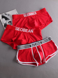 กางเกงบ็อกเซอร์ชายผ้าฝ้ายแท้สีแดงสดสำหรับวัยรุ่นและเยาวชนในปีชง ทรงหลวมสบาย ๆ ผลิตจากผ้าฝ้ายแท้