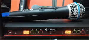 Tosunra BLX-288A Wireless Microphone Set with Receiver and Carrying Case. Two microphones with colored accents receiver with antennas and portable case. Suitable for presentations and performances.