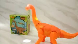 Mainan Anak Dinosaurus Bertelur Berjalan Ada Lampu Dan Gigit Daun