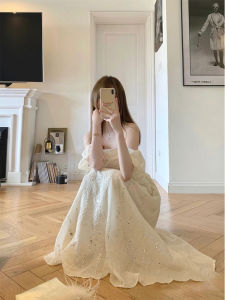 ชุดเดรสยาวแขนพองสีขาวประดับเลื่อมสไตล์ฝรั่งเศส ชุดราตรียาวเอวสูง แขนกุด คอวี กระโปรงทรงเอ ฤดูร้อน 2024