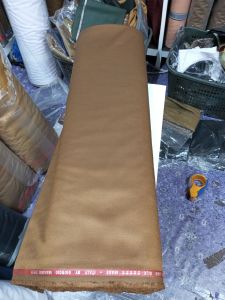 KAIN BAHAN PEMDA KHEKI SEMIWOLMENGKILAP