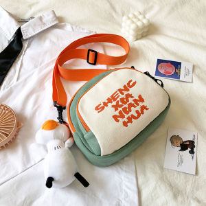 กระเป๋าสะพายข้างผ้าใบญี่ปุ่นสไตล์เกาหลีสำหรับผู้หญิง กระเป๋าสะพายไหล่แบบลำลอง กระเป๋าสะพายข้างแบบสะพายข้าง วัสดุผ้าใบ ปิดด้วยซิป ขนาดกลาง