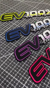 (1คู่) สติกเกอร์โลโก้  EV100%  สำหรับติดรถจักรยานไฟฟ้าจักรยานไฟฟ้าแม่บ้านสกู๊ตเตอร์ไฟฟ้า งานตัวนูน สั่งทำสีพิเศษได้