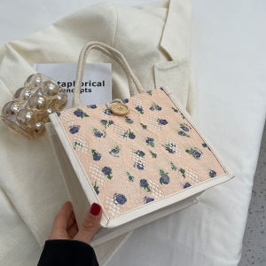 กระเป๋าใส่อาหารสไตล์ญี่ปุ่นผ้าใบ Canvas ลายดอกไม้สำหรับใช้ทำงานในฤดูร้อน 2025 กระเป๋าสะพายข้างขนาดเล็กสำหรับใส่ของขวัญ