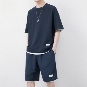 ROMON | ชุดกีฬาลำลองชายฤดูร้อน ชุดเสื้อยืดแขนสั้นผ้าฝ้ายผสมโพลีเอสเตอร์ ชุดกางเกงขาสั้น 2 ชิ้น ระบายอากาศได้ดี ใส่สบาย