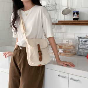 กระเป๋าผ้าใบผูกข้างแบบลำลองสไตล์วินเทจ กระเป๋าสะพายไหล่ข้างเดียวสำหรับเดินทางและไปโรงเรียน กระเป๋าผ้าใบสไตล์ฮาราจูกุ