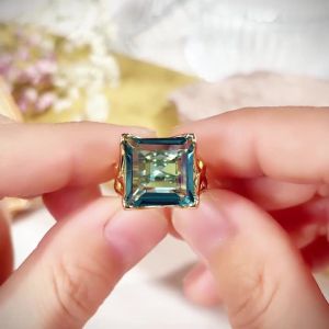 Huitan Cross Hollow Design Women Gold Color Ring Inlaid Bright White/Blue CZ Fashion Wedding Accessories Elegant Party Jewelry