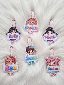 Personalized Kawaii Chibi Laminated Name Keychain with colorful cartoon characters and names: Sophia Mhavic Jacob Bea Clarisse Sally.