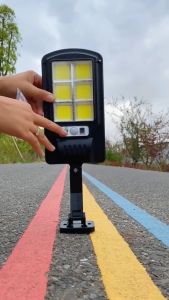 Lampu tenaga surya BK-818-6 50 W yang dilengkapi Sensor Gerak + Remote COB dan pengisian daya menggunakan tenaga surya