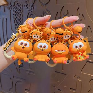 PICKIT อะนิเมะการ์ฟิลด์ พวงกุญแจตุ๊กตาการ์ฟิลด์ การ์ตูนลายการ์ตูน ซิลิโคนทำจากซิลิโคน จี้การ์ตูน น่ารักน่ารักๆ พวงกุญแจรูปกุญแจ