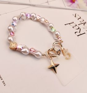 สร้อยคอโทรศัพท์มือถือแบบพกพาสำหรับผู้หญิง สร้อยคอแบบสั้นสีสันสดใส ทำด้วยมือ สร้อยคอแบบพกพาที่มีหัวเข็มขัดแบบพิเศษ