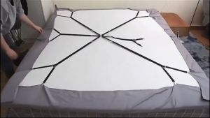 Bed Sheet Holders With Adjustable Straps And Triangle Clips For A Secure Fit