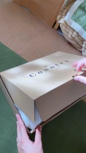 Đầm xoè maxi trễ vai The Country White Feather vải linen tơ trắng