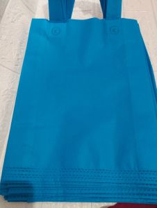 Tas Parcel Lebaran Idul Fitri Haji Umroh Tebal 12 pcs Uk. 25x35 cm Goodie Bag Kain Spunbond Press