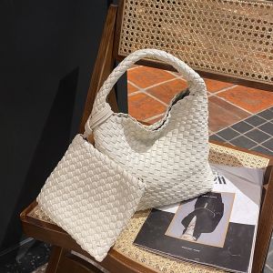 กระเป๋าถือหนังแท้ผูกโบว์มือทำลายขนาดใหญ่สำหรับผู้หญิง กระเป๋าสะพายไหล่ข้างเดียวแบบเรียบง่ายและใช้งานได้หลากหลาย กระเป๋าถือแบบทันสมัยสำหรับผู้หญิง