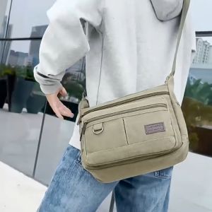กระเป๋าแฟชั่น กระเป๋าสะพายข้างผู้ชายผ้าใบจุของได้เยอะ ใบใหญ่ ทันสมัย
