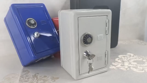 Childrens Coin Bank Metal Mini Piggy Bank with Key Lock Combination Lock Secure Money Saving Storage Locking Box for Kids Boys Girls Home Classroom Use Creative Safe Strongbox Shape Desktop Ornaments Single Digit Security Money Deposit Valuables Storage