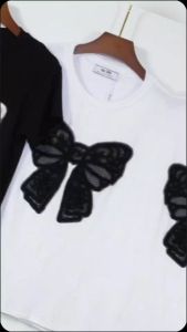 เสื้อยืดแขนสั้นปักโบว์ ผ้าเรย่อน นิ่มยืด 2สีสวยๆ