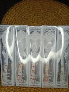 vania souvenir..sendok makan melamin putih isi 50 pcs kemasan mika.bagus buat hadiah pernikahan cantik dan lucu