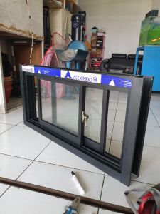 kusen aluminium 4" model jendela sliding kanan kiri ukuran T60 x L120 kaca 5mm full. BAHAN INKALUM LEBIH TEBAL