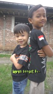 (SMA16)KAOS SYEKHERMANIA"SANTRI AL-MUMIN"LENGAN PENDEK UKURAN ANAK DAN PANJANG(FREE STIKER)