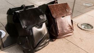 Vintage Retro Travel Book Bag: A High-Quality PU Leather Laptop Backpack