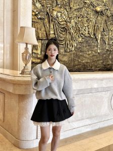 Elegant French Style Black High Waist A-Line Mini Skirt with Lace Splicing And Butterfly Knot by Xie Anran for Autumn 2024