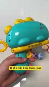 Đồ chơi súng ném bóng dính súng bắn phi tiêu cho bé Kenmart tặng kèm 6 bóng bảng phi tiêu khủng long và móc treo