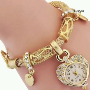 Đồng Hồ Lắc Tay Nữ Đính Đá Hình Trái Tim Fashion Qúy Tộc Bằng Hợp Kim Không Gỉ